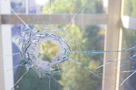 Picture of a broken window needing to be repaired by a window specialist.