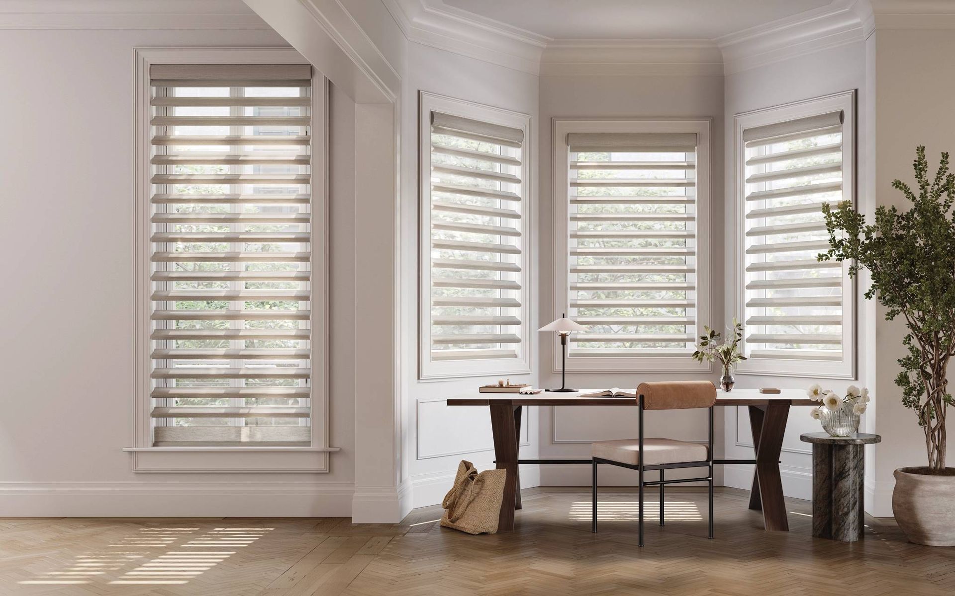 Hunter Douglas sheer shades on several windows in a cozy yet minimalist small home office setup
