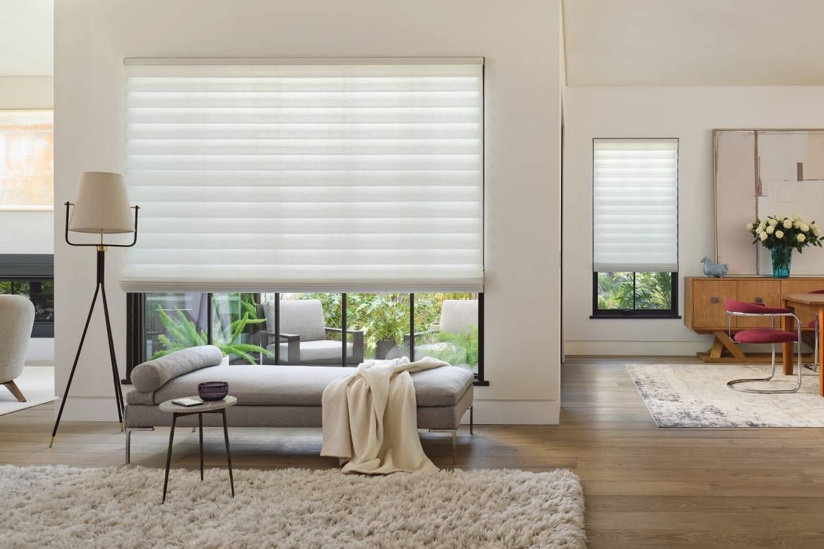 Hunter Douglas Vignette® Roman Shades on a couple types of windows in a home