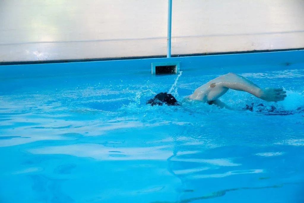 A Person is Swimming in a Swimming Pool — Affinity Swim in Norman Gardens, NSW