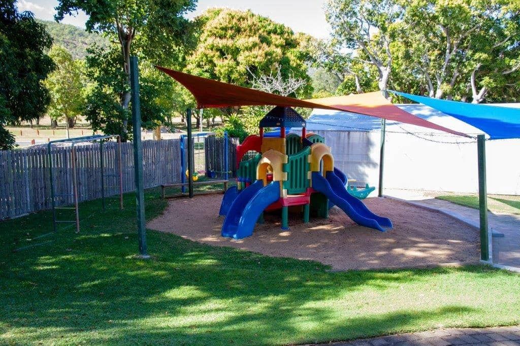 A Playground With a Slide and a Slide Under a Canopy in a Park — Affinity Swim in Norman Gardens, NSW