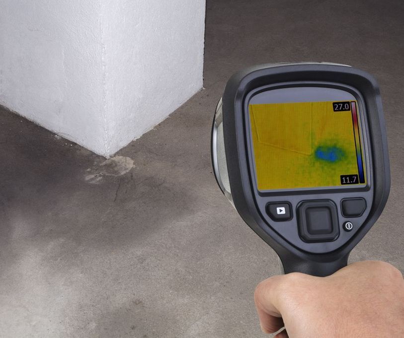 A Person is Using a Thermal Camera to Take a Picture of a Cube — Northern Plumbing In Mount Louisa, QLD