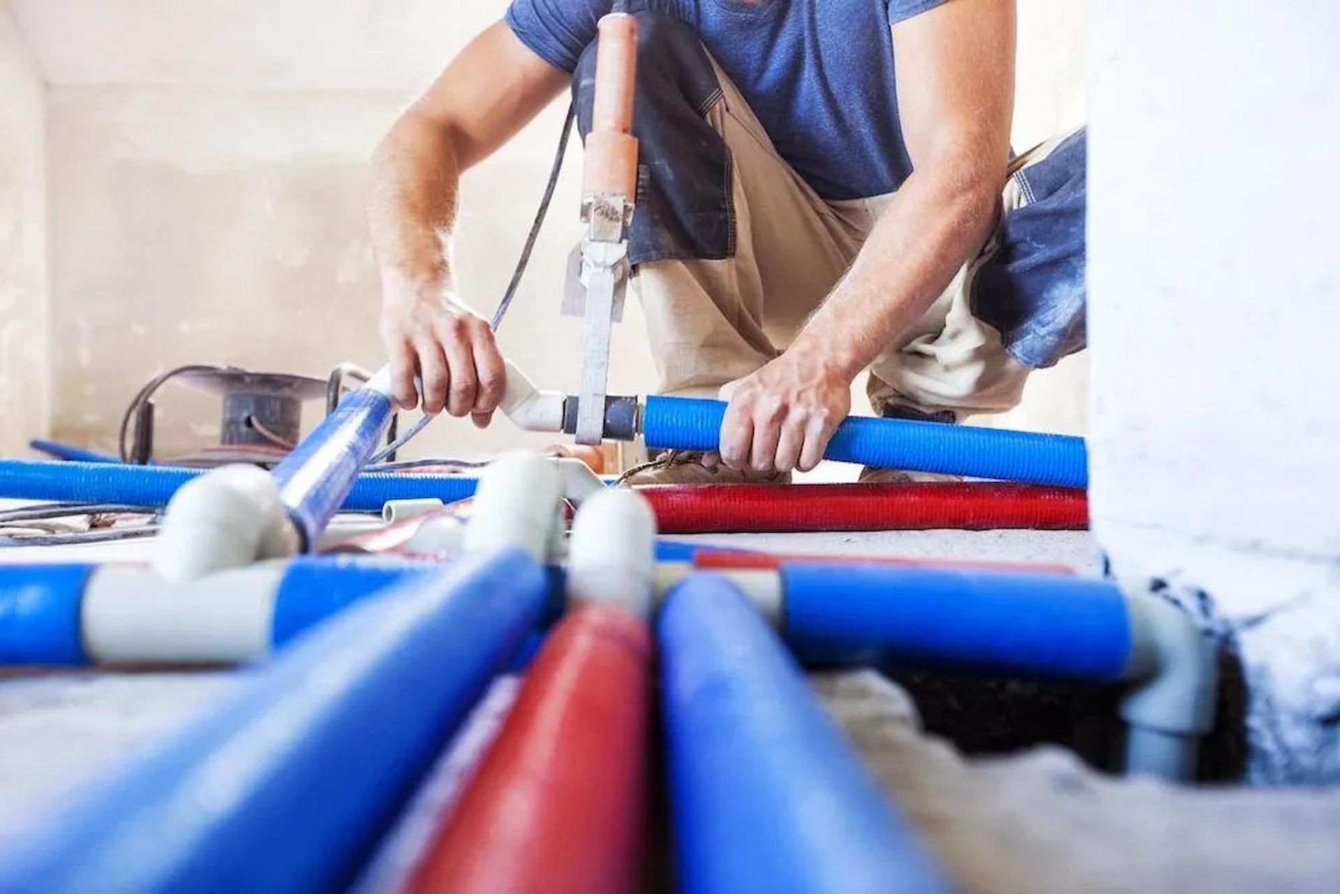 Plumber In Townsville Repairing Pipes With Professional Tools
