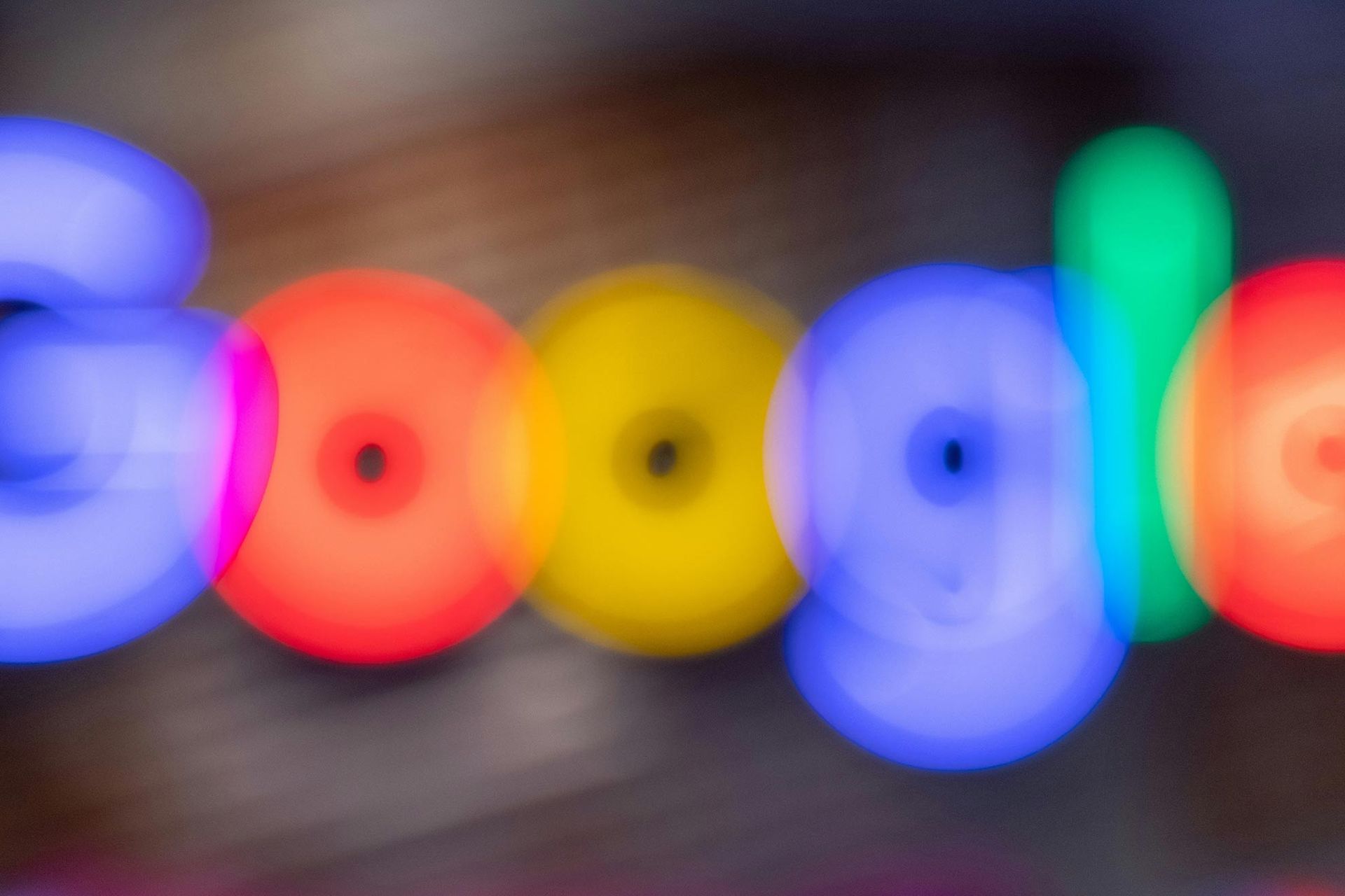 Out-of-focus neon sign spelling