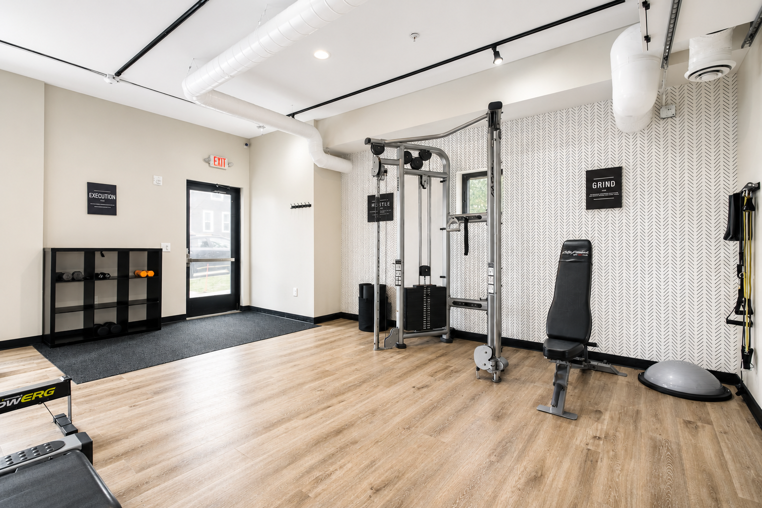 Photo of the fitness center, showing the entrance in the background