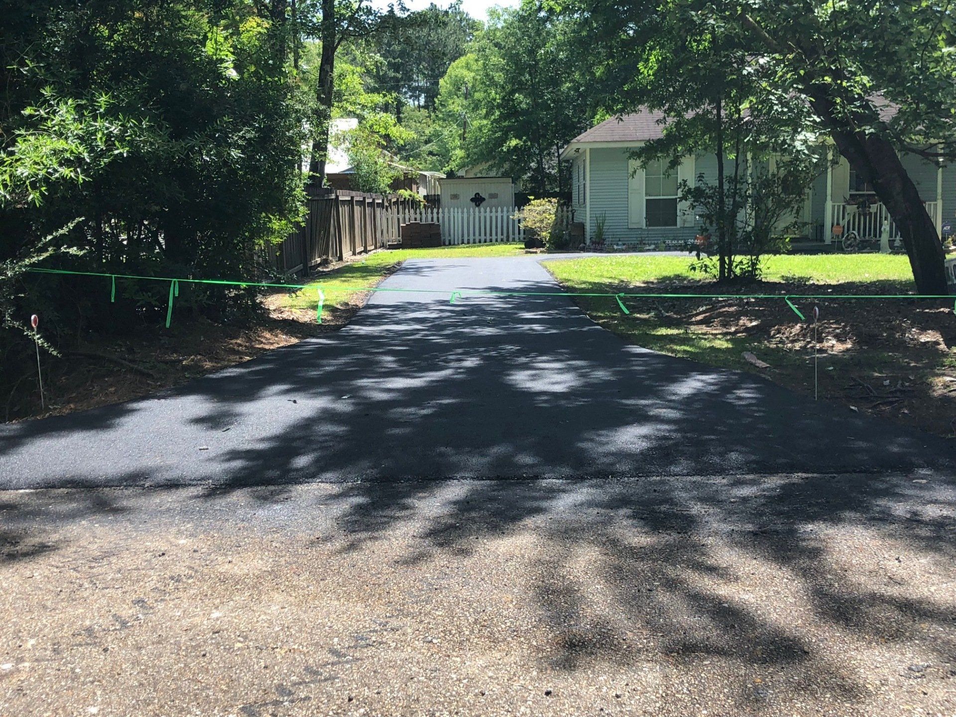 A Walkway Surrounded by Trees — Covington, LA — Jenkins Construction and Asphalt