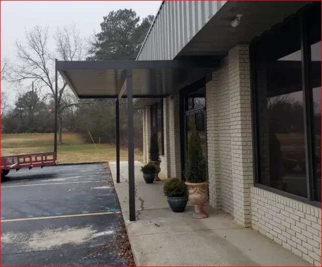 Building Black Metal Canopy — Decatur, AL — Evans Awnings