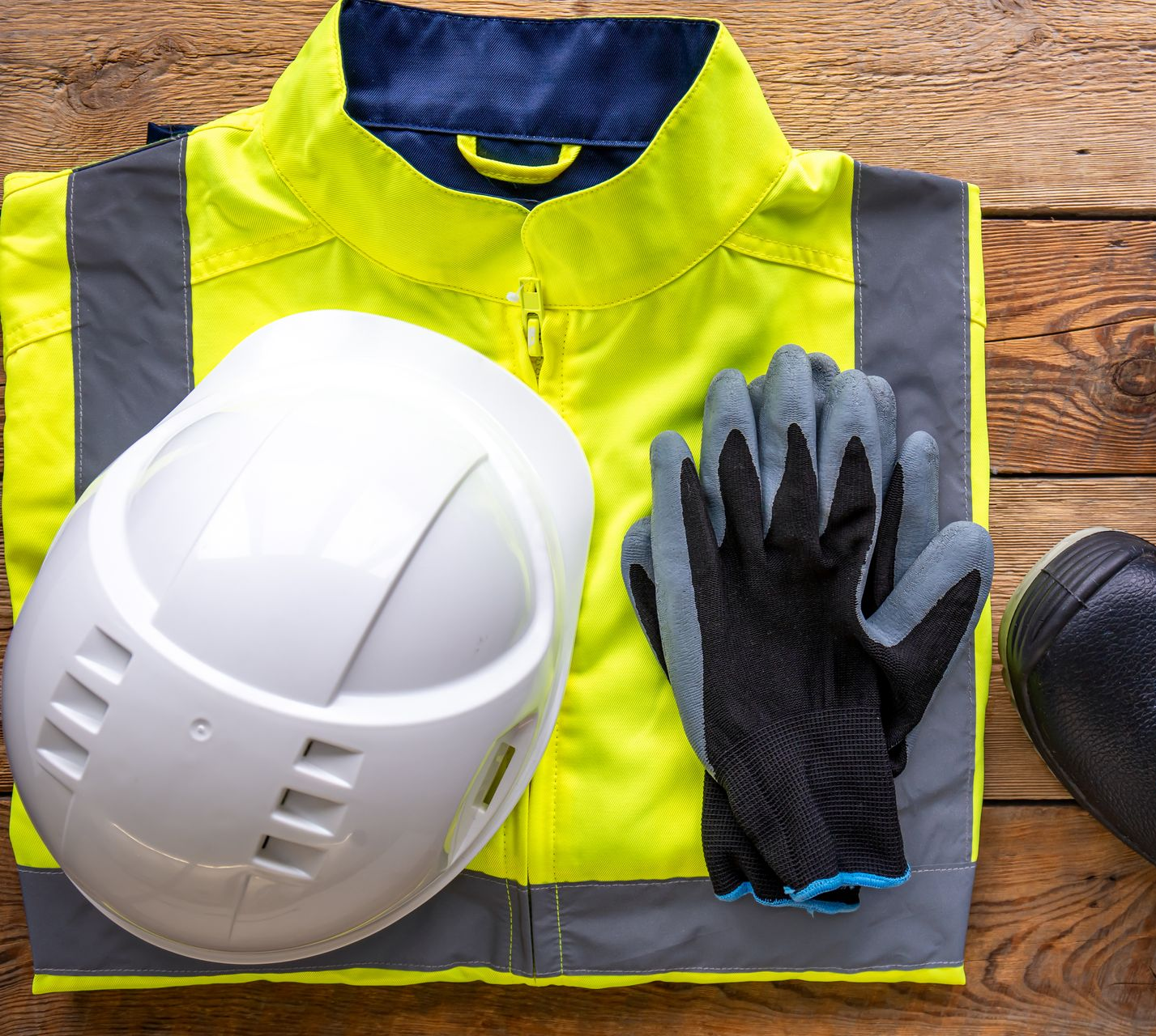 An Orange and Black Shirt With White Stripes on the Sleeves — Tableland Workwear In Tolga, QLD