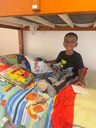 A Child enjoying a Snack