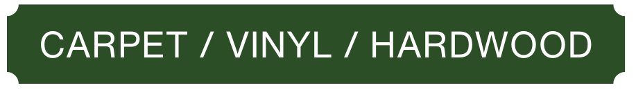A green sign that says carpet / vinyl / hardwood