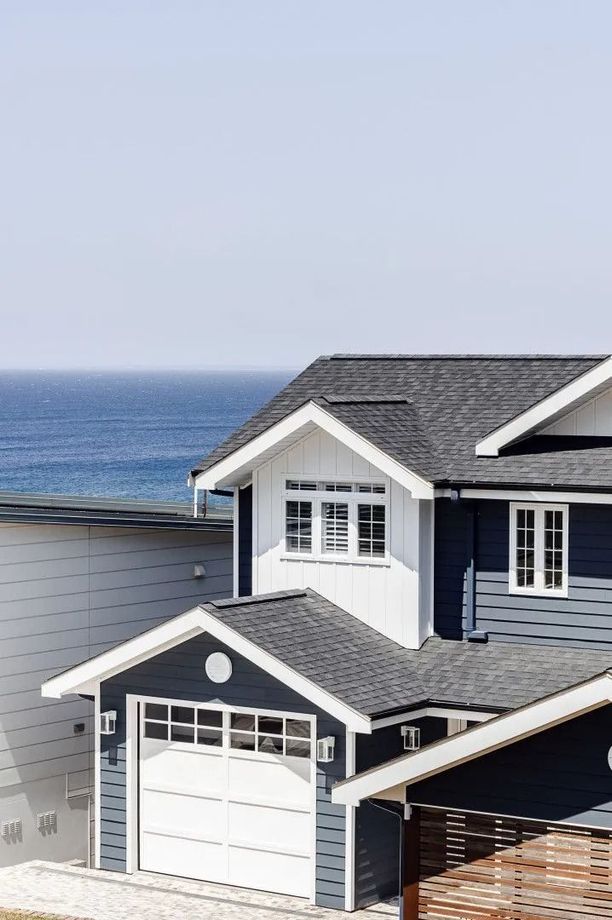 House overlooking water with double glazed windows in frame