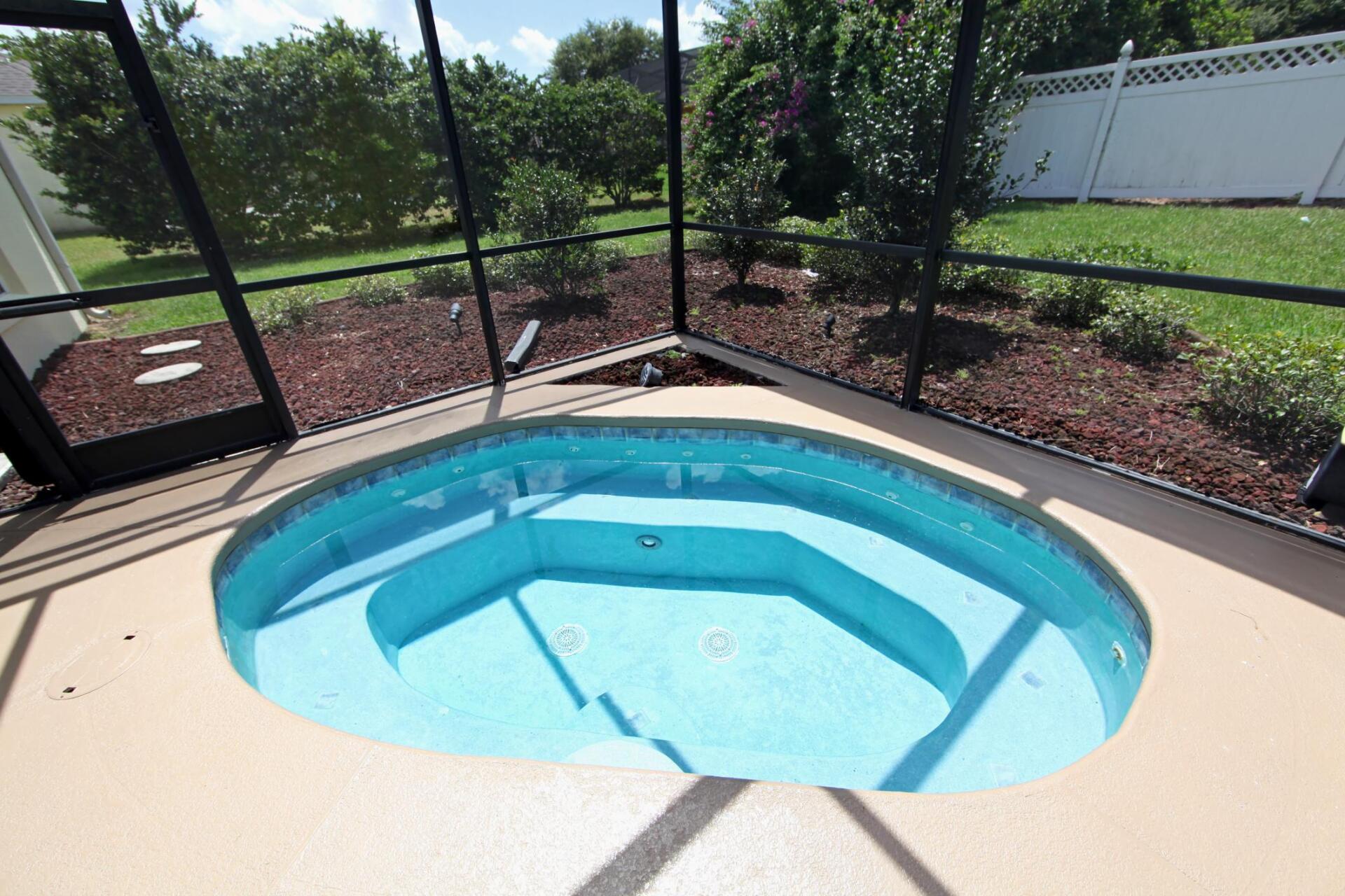 hot tub and spa inside of lanai
