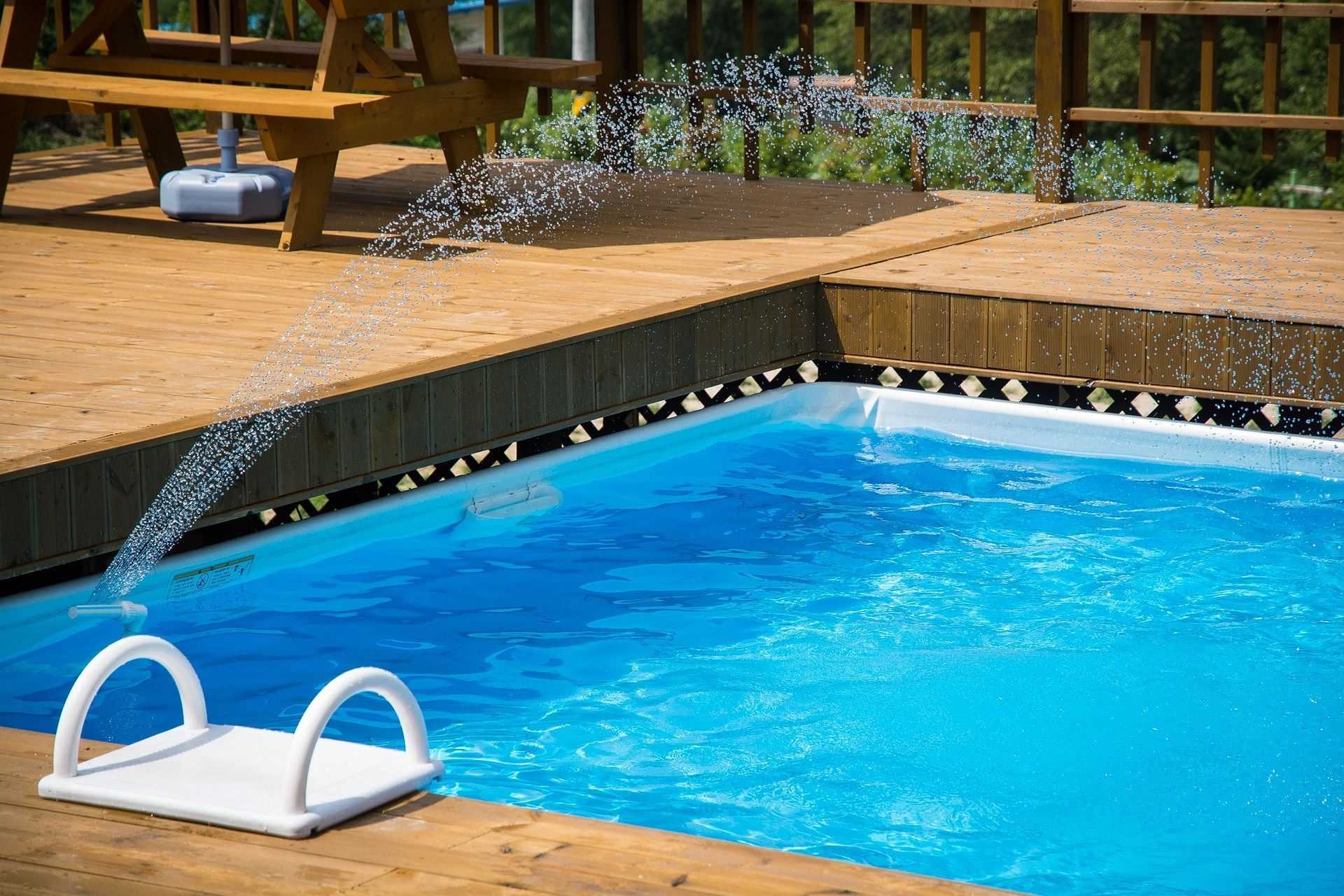 chairs beside the pool