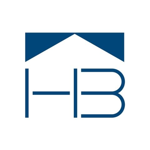 A blue and white logo for a real estate company.