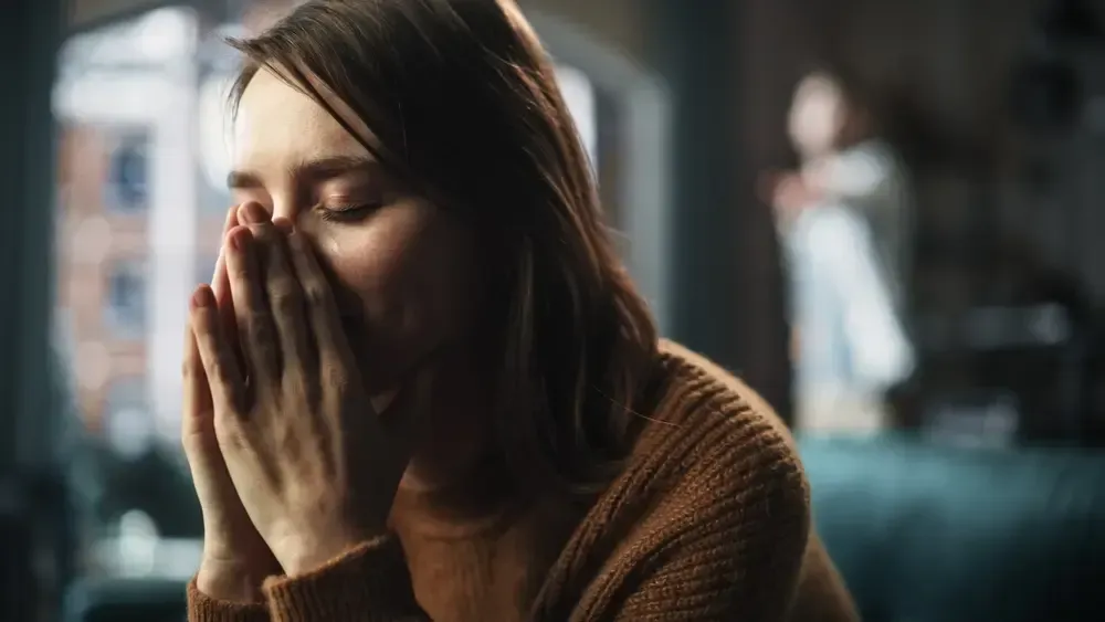 Woman crying during narcissistic abuse.