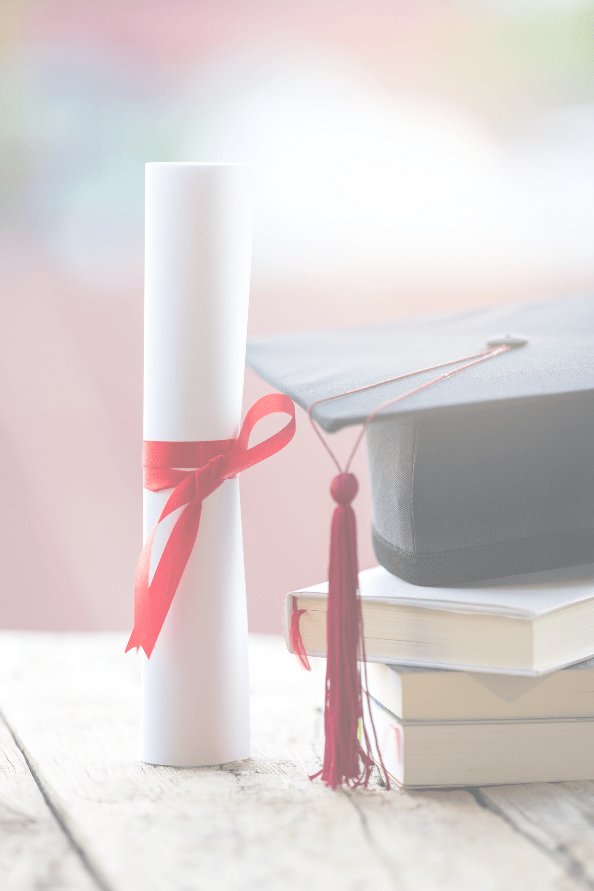 Image of diploma and graduation cap