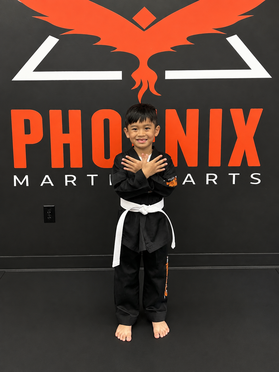 Khang as a young beginner starting Taekwondo at Phoenix Martial Arts