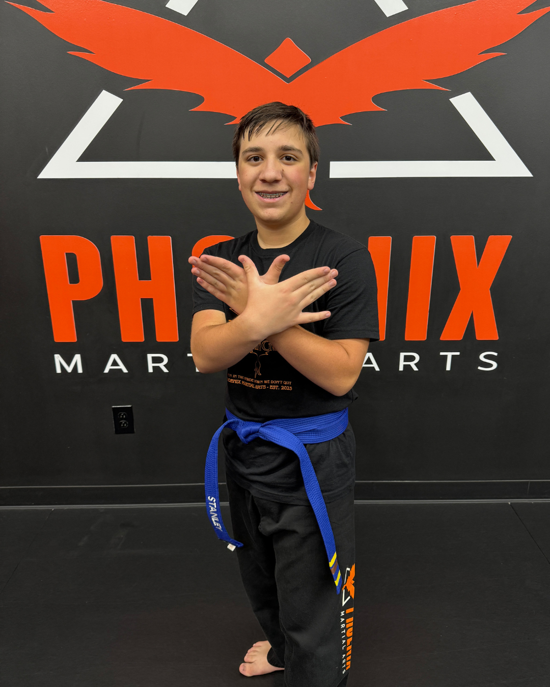 Stanley today as a teen martial arts student and leader at Phoenix
