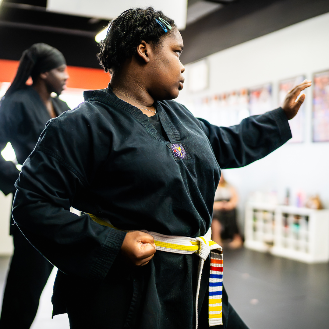 dult martial arts student practicing a knife hand strike at Phoenix Martial Arts in Murfreesboro, TN