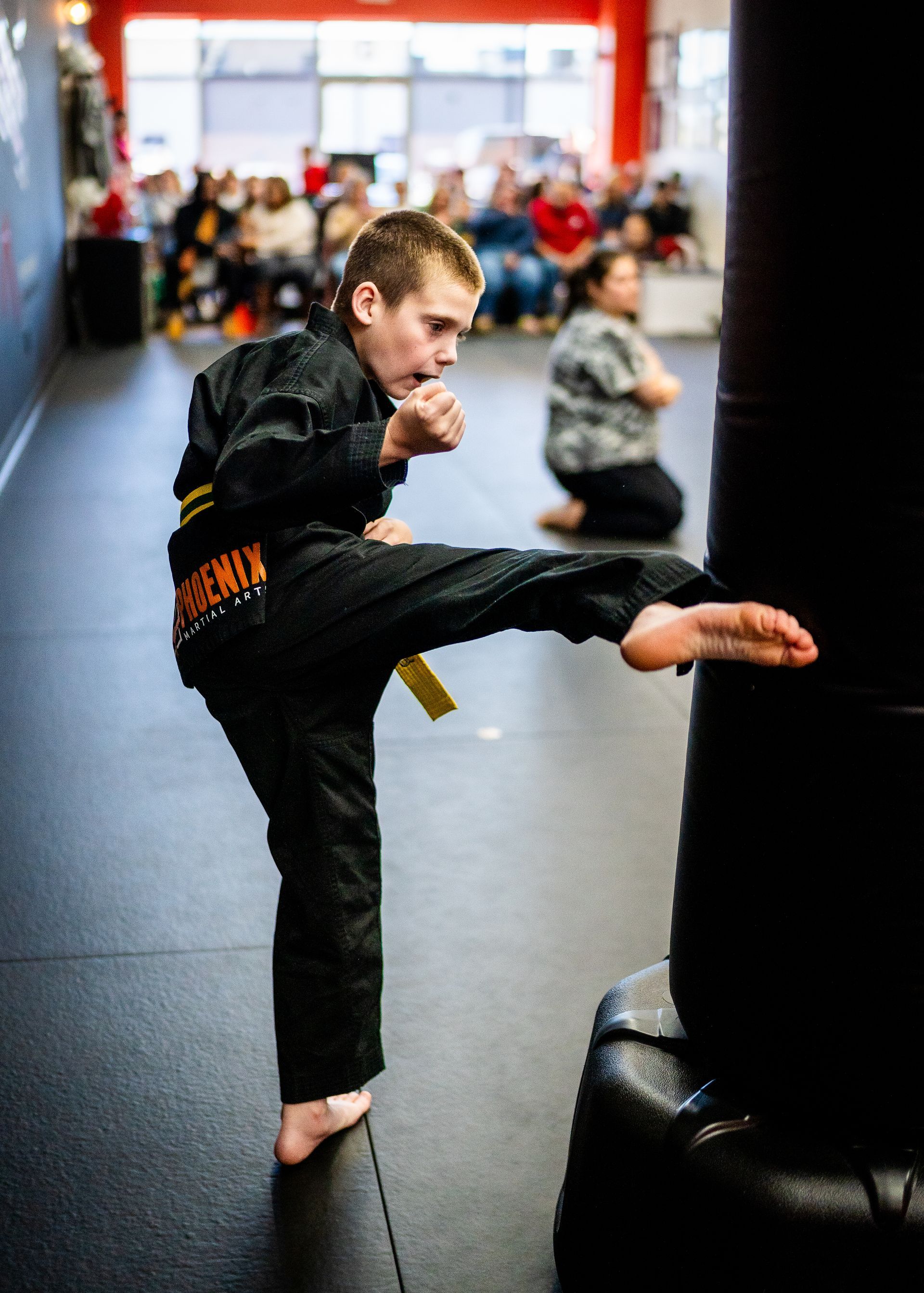 Young student practicing punching drills during kids martial arts class at Phoenix Martial Arts in Murfreesboro, TN