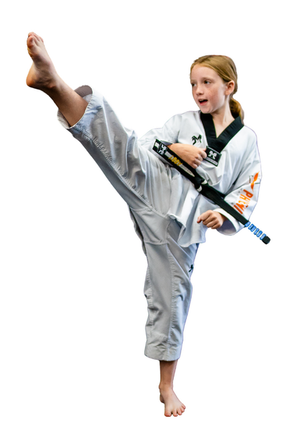 Student performing a round kick at Phoenix Martial Arts in Murfreesboro, TN