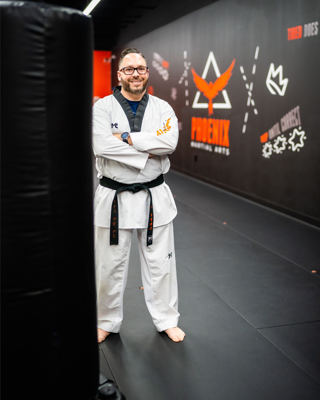 Master Dustin Sands with his family at Tennessee Taekwondo in Mt. Juliet, Tennessee