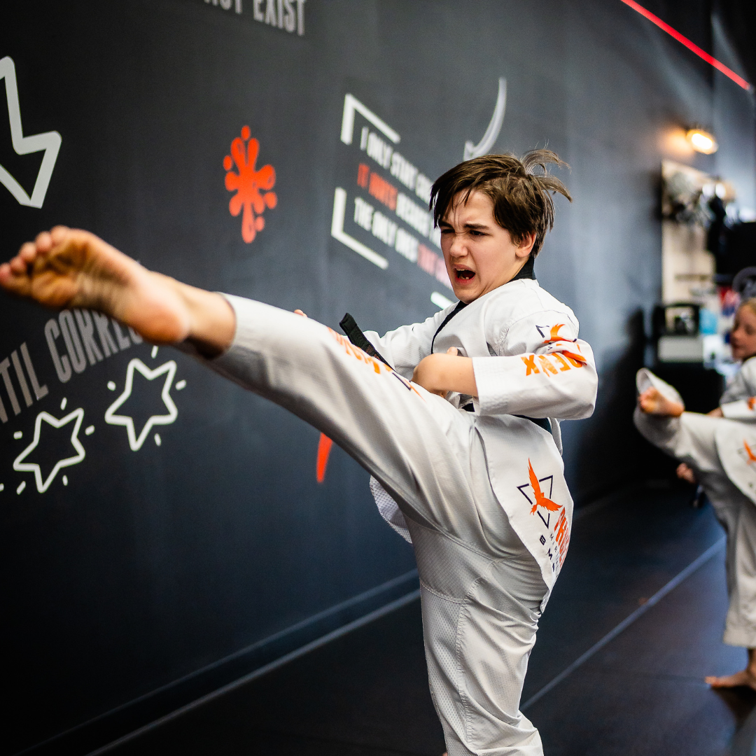 Teen student practicing a martial arts strike during Taekwondo training at Phoenix Martial Arts in Murfreesboro, TN