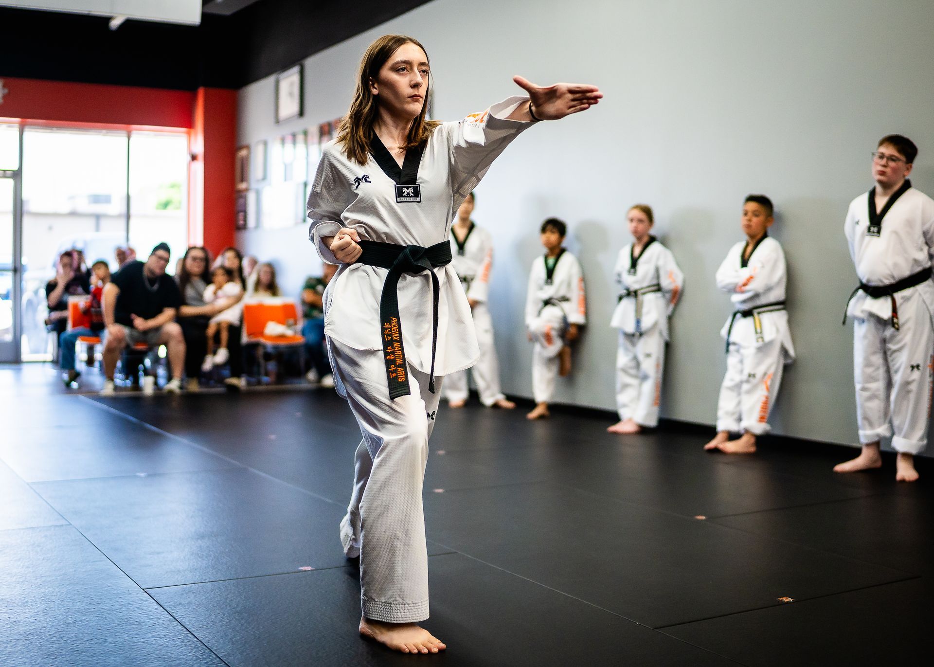Teen martial arts student practicing Taekwondo forms with focus and precision at Phoenix Martial Arts in Murfreesboro, TN