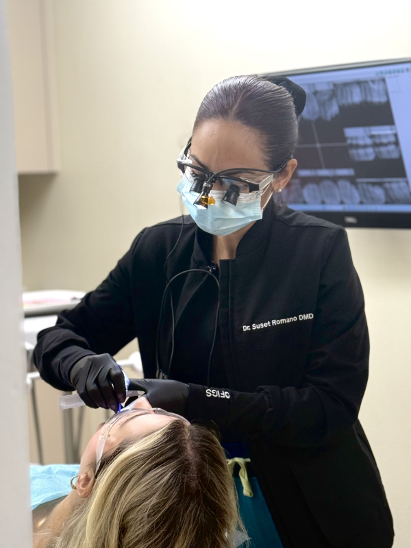 Dr. Romano Operating on Patient