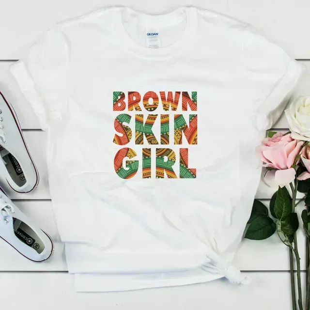 a white t-shirt with the words brown skin girl on it