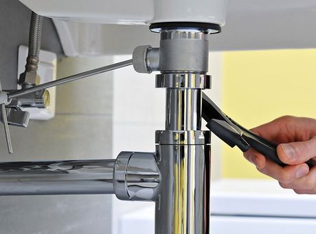 Plumber Repairing The Sink — Santa Clarita, CA — Larsen Plumbing
