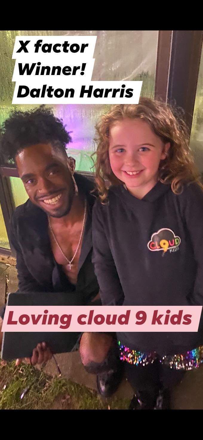 a man and a little girl are posing for a picture .