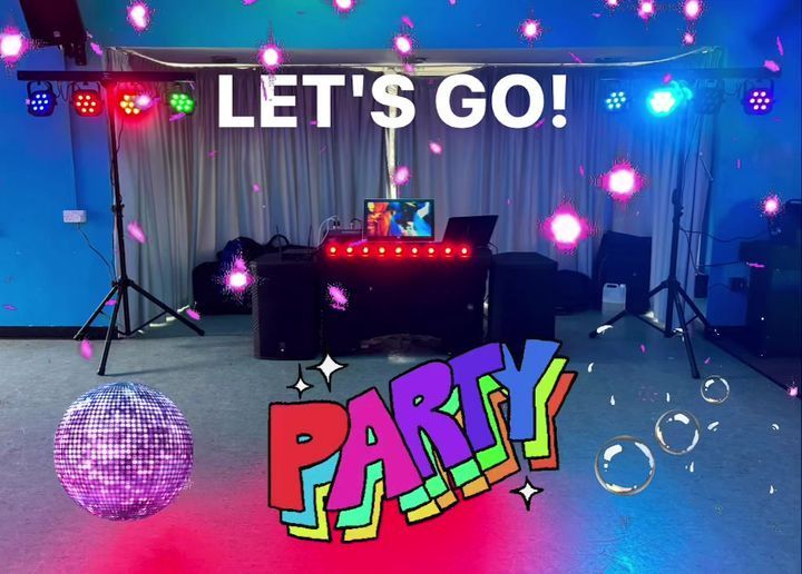 a room with a disco ball and the words let 's go party