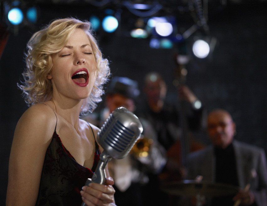 Woman singing in nightclub