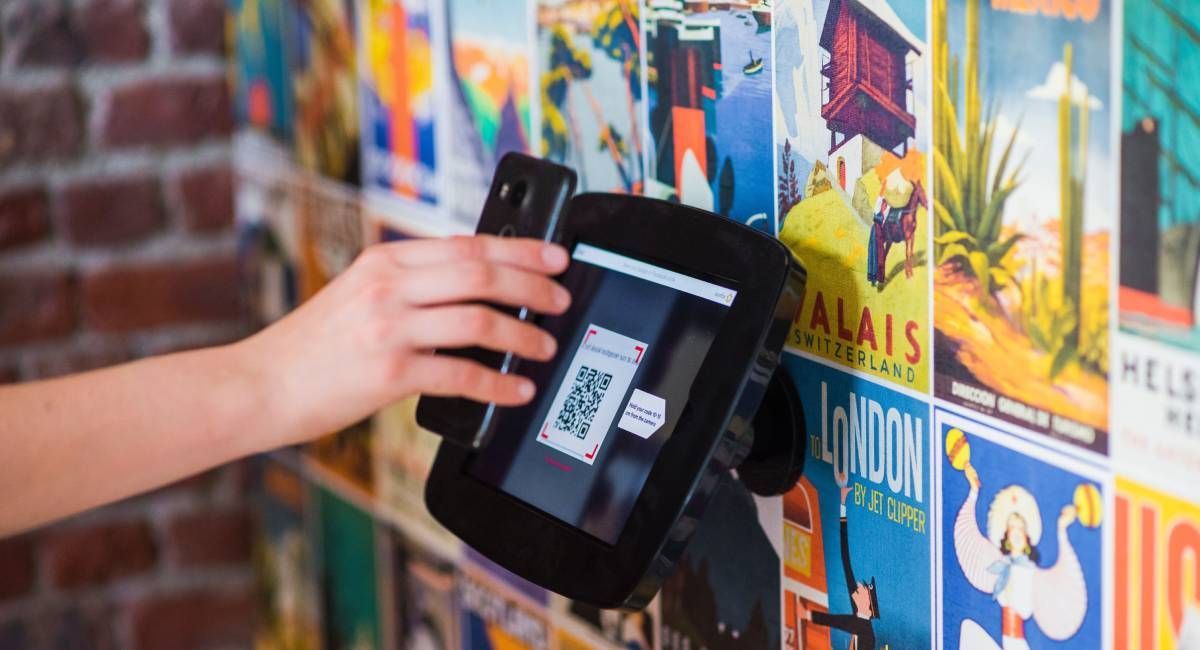 A person scanning a QR code