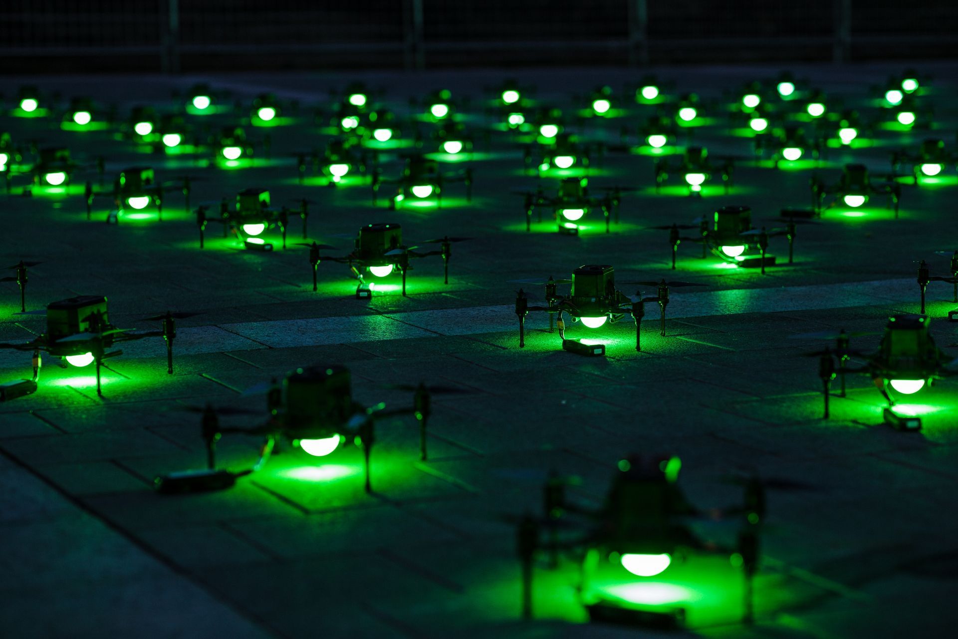 A mesmerizing drone show paints the night sky with synchronized lights and patterns.