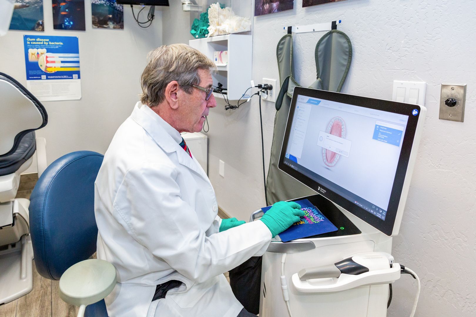 A computer monitor with a picture of teeth on it.