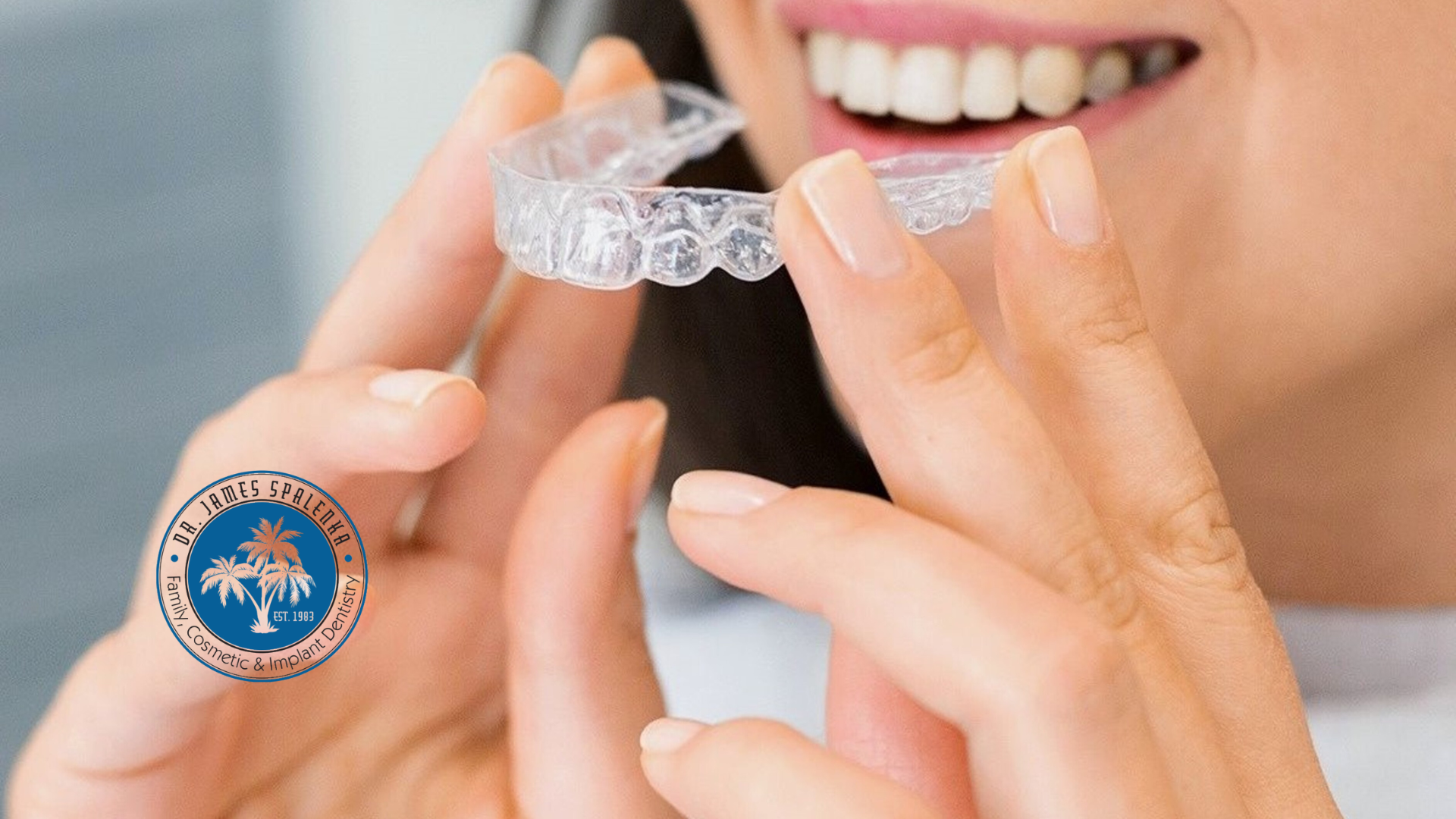 A woman is getting her teeth examined by a dentist.