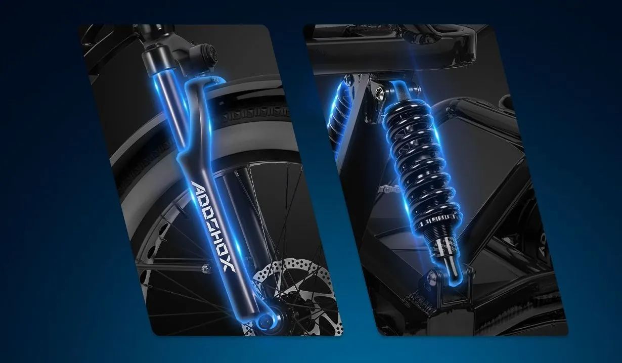 Blue LED bicycle suspension fork and rear shock on a black bike frame, shown in close-up.