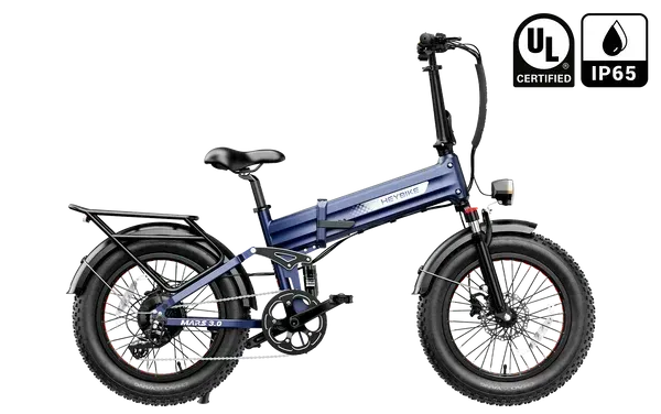 Blue folding electric bike with fat tires, rear rack, and UL/IP65 certification icons