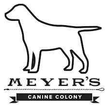 Meyer’s Canine Colony logo with a dog silhouette and banner text