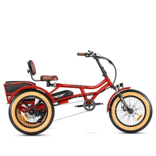 Red recumbent tricycle with tan tires, black seat, and cargo rack on a white background