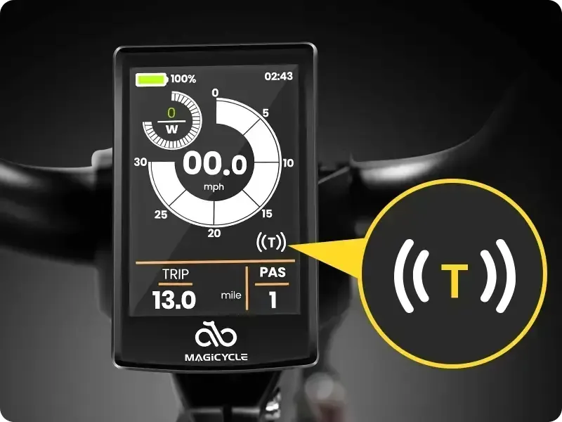 Motorcycle display showing a T-mode indicator highlighted in yellow on a black screen