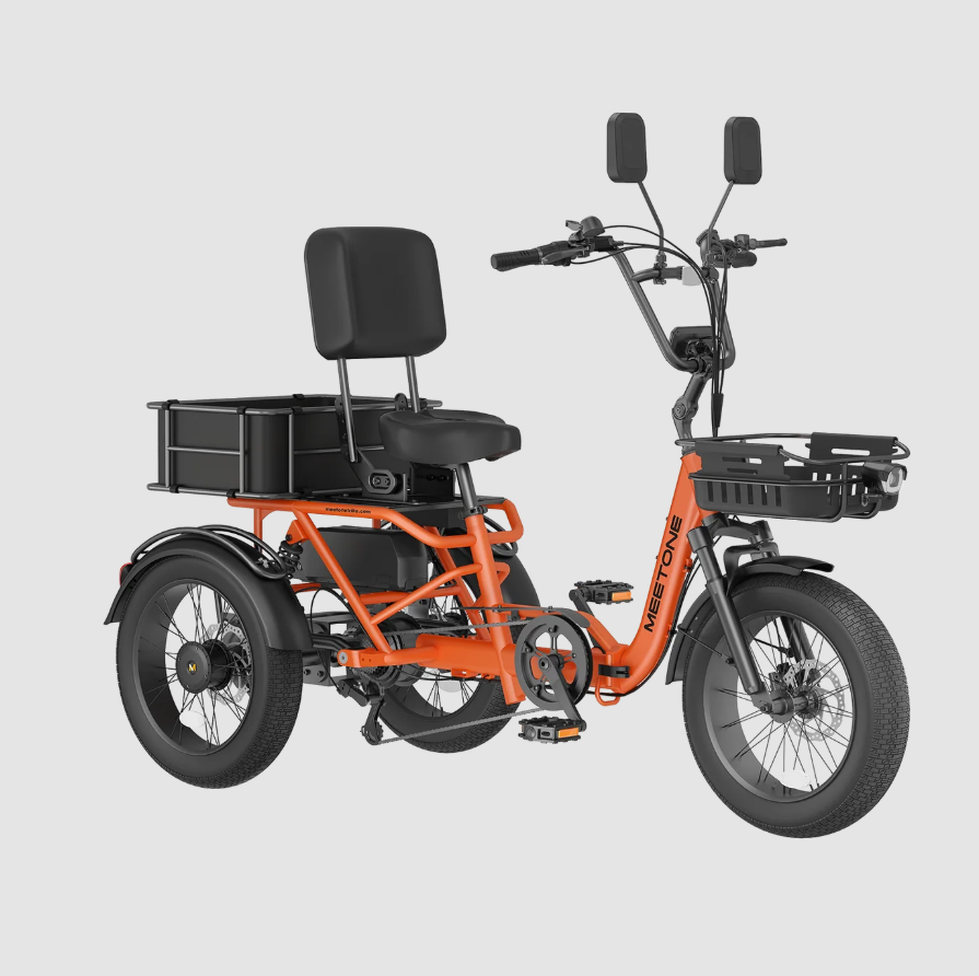 Orange cargo electric tricycle with black seat, front basket, and handlebars on a plain gray background
