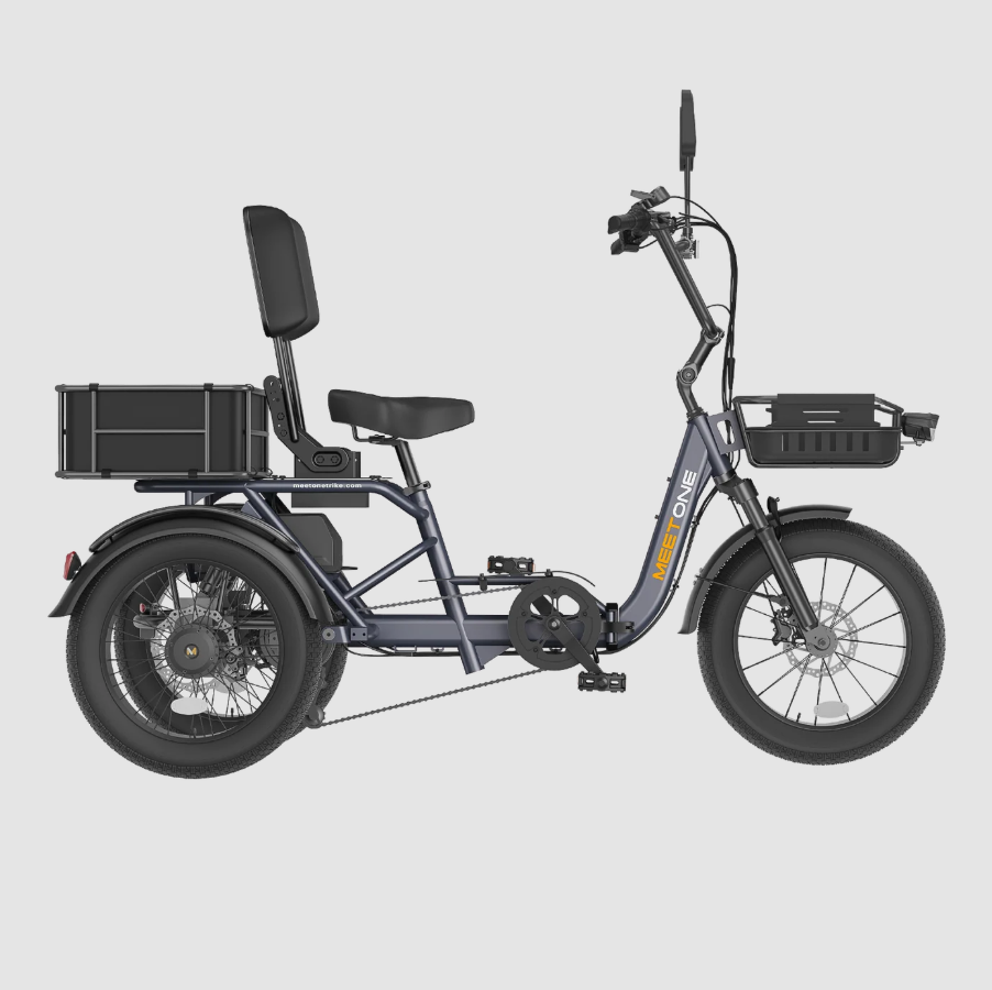 Side-view of a black electric cargo tricycle with rear rack, seat, and front basket on a gray background
