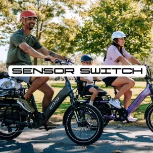 Cyclists riding electric bikes on a tree-lined road with “SENSOR SWITCH” text overlay