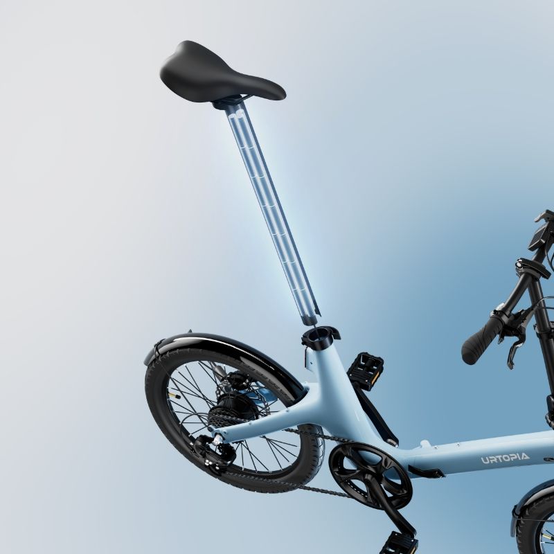 Blue folding bicycle with raised seatpost and rear wheel shown against a light blue background