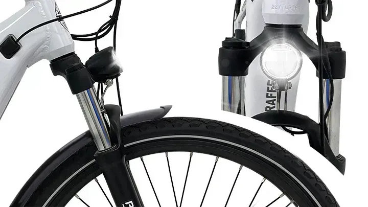 Front bicycle basket holding a clear water bottle, with the front wheel and fork visible.