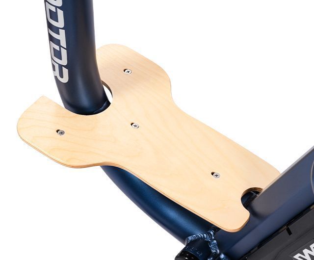 Wooden bike chain guard mounted around a black bicycle frame