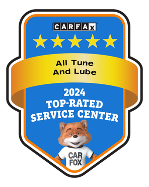 A badge that says carfax all tune and lube 2024 top rated service center